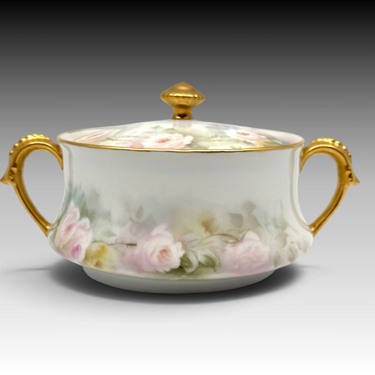 T&V Limoges porcelain biscuit jar with gilded handles and lid